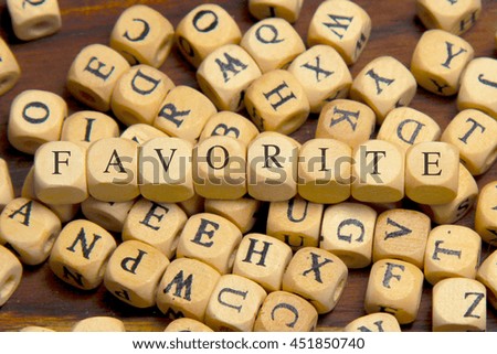 FAVORITE word written on wood block