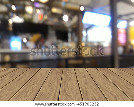 Perspective wood with blurred shopping mall background. product display template