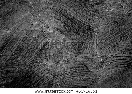 abstract black textured rough plaster walls background