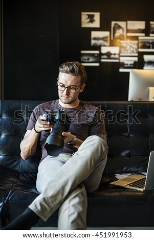 Photographer Working Checking Photo Concept
