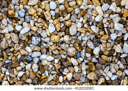 Gravel Texture.  Wonderful highlights of color accentuate this gravel texture.  Perfect as a natural texture/background in the next project.