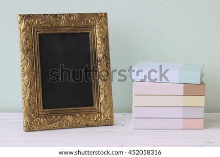golden vintage frame isolated on white table