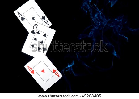 Background with playing cards on black background