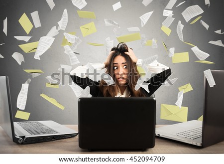 Businesswoman stressed by spam Royalty-Free Stock Photo #452094709