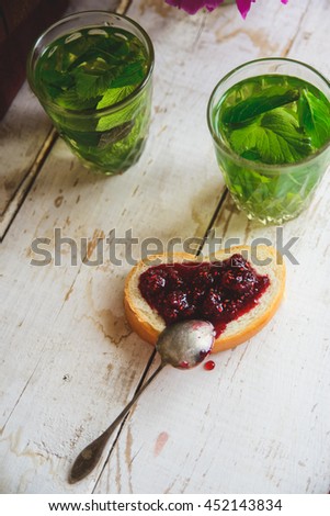 toast with raspberry jam and mint tea