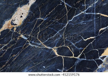 Gold, yellow and white patterned natural structure of dark gray blue marble texture background. Royalty-Free Stock Photo #452159176