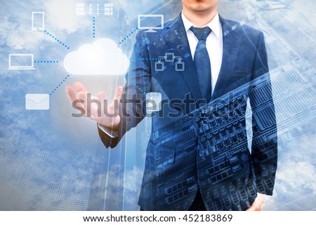 Double expoure of professional businessman connecting cloud technology on hand with cloud and sky in Technology, Communication and business concept