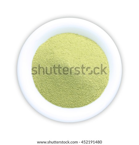 Matcha green tea powder isolated on white background.