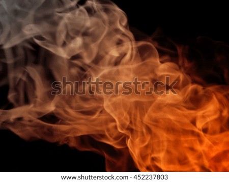 Texture fire flame with smoke on black background