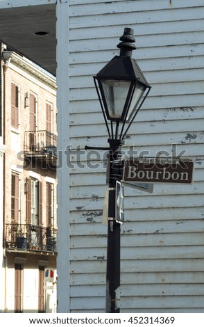 Bourbon Street, New Orleans, Louisiana bent street lamp