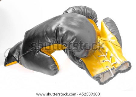 Black boxing gloves on white background.