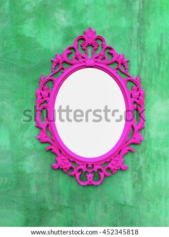pink Picture frames or mirrors on the walls green