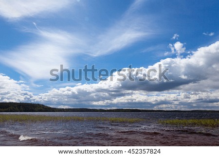 Summer landscape with lake and sky