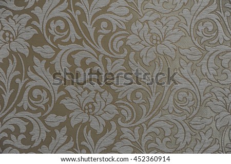 Brown fabric wallpaper with patterns (background)