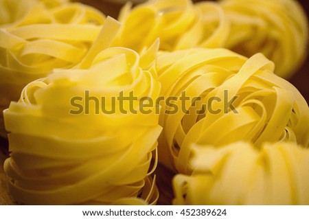 Italian Pasta on the wooden table at the kitchen  - food picture