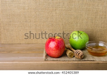 Honey and apples for Rosh Hashanah celebration. Jewish New Year Holiday.