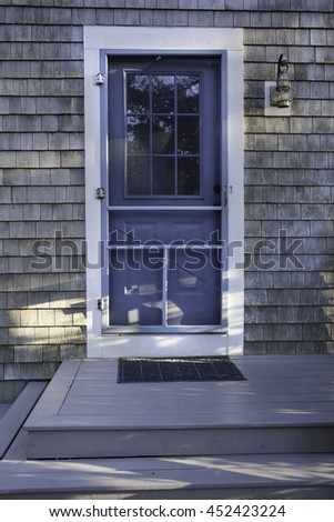 Front door of a house in Wellfleet, MA on Cape Cod.