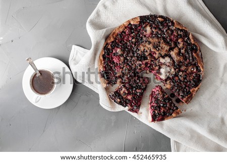 pie tart on a gray background with coffe , above view