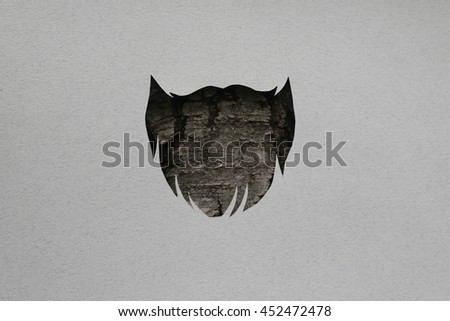 Hipster beard concept cut of paper, natural birch tree bark on background