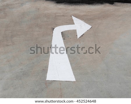road sign turn right on asphalt painted with white color