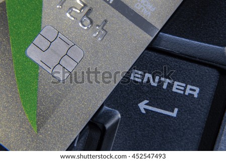 Online shopping with close-up keyboard and close-up credit card