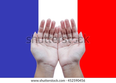 human open empty hands to pray for France on France flag background