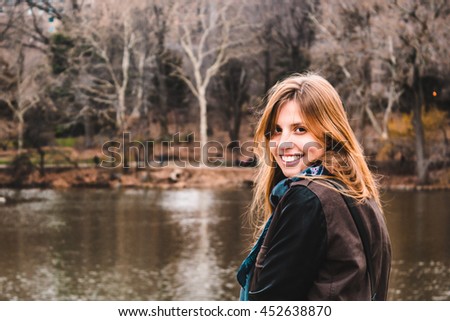 Photo of Girl in front of trees at the Central Park in Manhattan, New York City