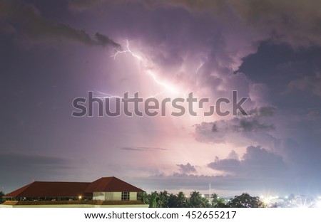 Thunderstorm with huge lightning over night city and blur with long speed shutter