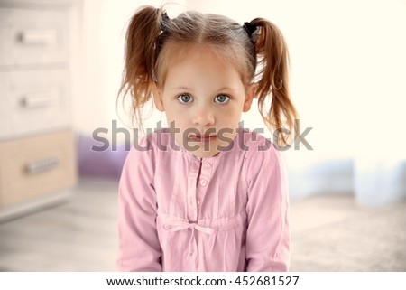 Portrait of small cute girl