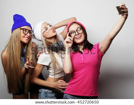 hipster girls best friends taking selfie
