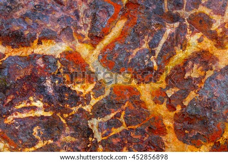 red yellow stone texture background,select focus with shallow depth of field:ideal use for background.