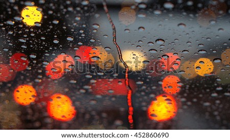 Transportation and traffic concept - Raining Day with traffic jam in blurred