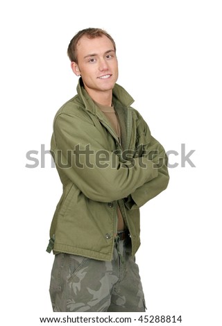 one fit attractive soldier in green and brown with dogtags and jacket half length portrait over white