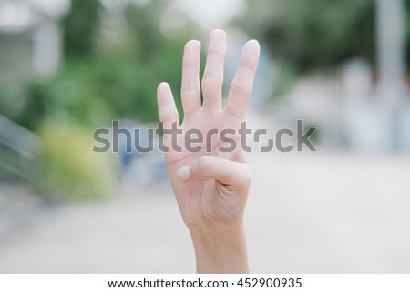 Numbers four in sign language