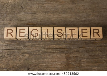 REGISTER word on wooden cubes