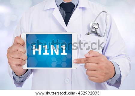 H1N1 Doctor holding  digital tablet Royalty-Free Stock Photo #452992093