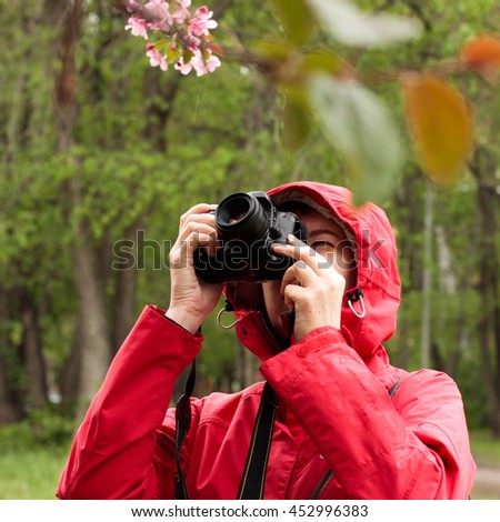 girl in a red jacket pictures of pink flowers of apple
