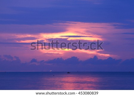 Colorful sky and colorful water in lake reflected in morning time before sunrise,Select focus with shallow depth of field,Soft focus,noise and grain due long exposure:ideal use for background.