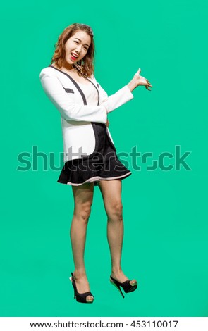 Asian Thai lady officer with business wear acting like smiling happy action on green screen background