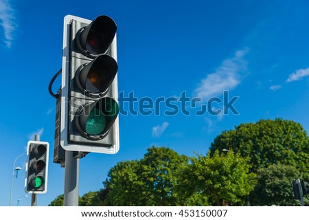 Green color on the traffic light.