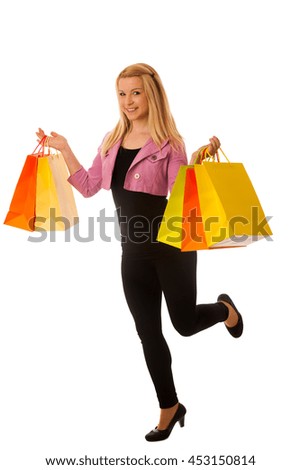 woman with shopping bags isolated over white background studio shot
