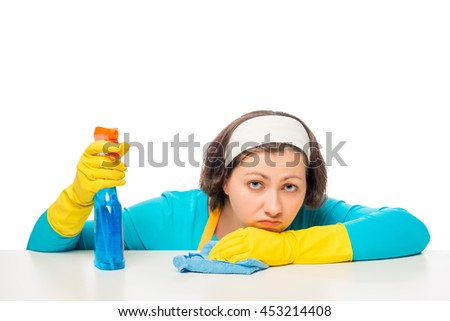 portrait of a woman, tired of household chores on a white background