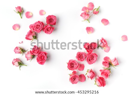 Framework from roses on white background. Flat lay. Royalty-Free Stock Photo #453295216