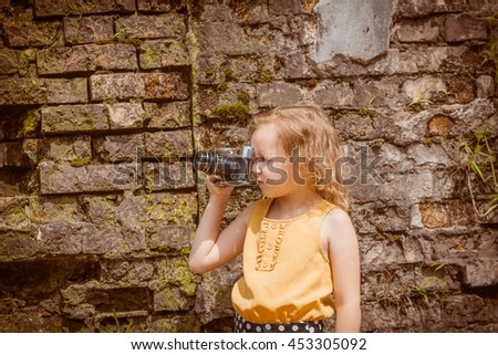 girl taking a photo