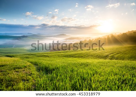 Sunrise in Crete Senesi region, Tuscany, Italy Royalty-Free Stock Photo #453318979