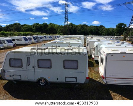 Caravans stored in rows on a sunny day. Royalty-Free Stock Photo #453319930