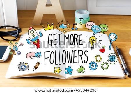 Get More Followers concept with notebook on wooden desk 