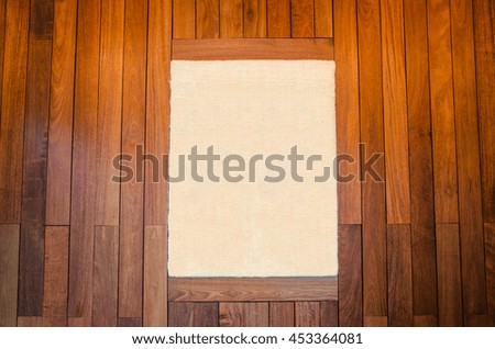 Blank of wooden photo frame on wood wall background