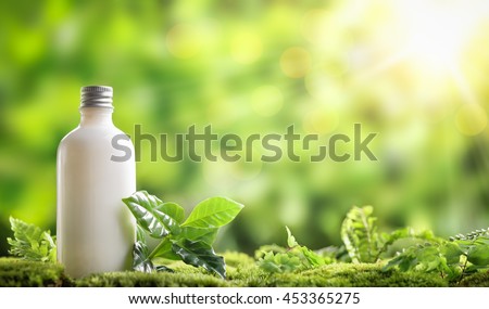 cosmetic bottle on nature background Royalty-Free Stock Photo #453365275