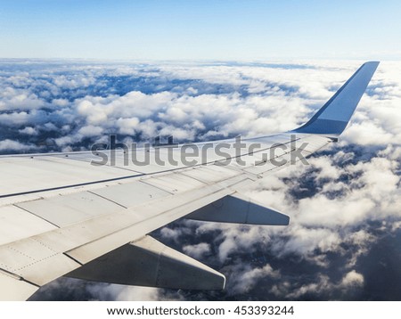 Aerial landscape. A view of the Earth's surface from a window of the flying plane